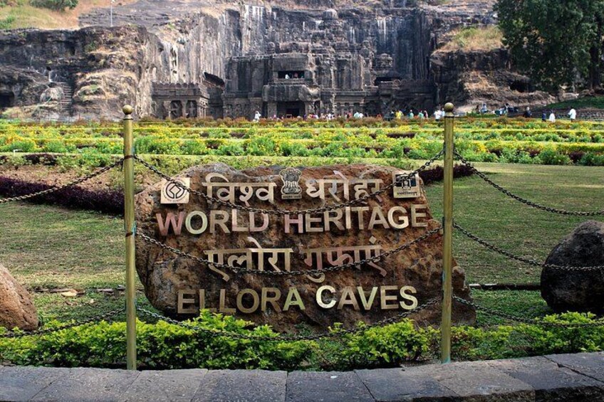 A sign for the Ellora Caves, labeled as a World Heritage site. 3