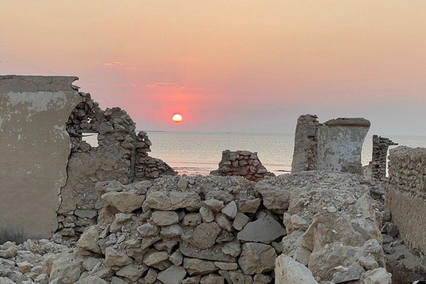 Ancient ruins with a sunset over the sea. 2