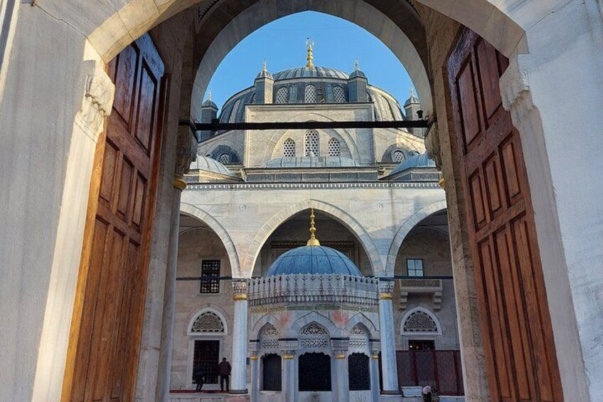 An architectural structure with arches and domes. 3