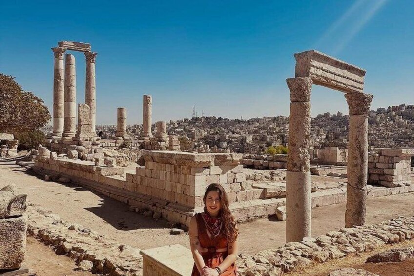 Ancient ruins with columns and stone structures. 5