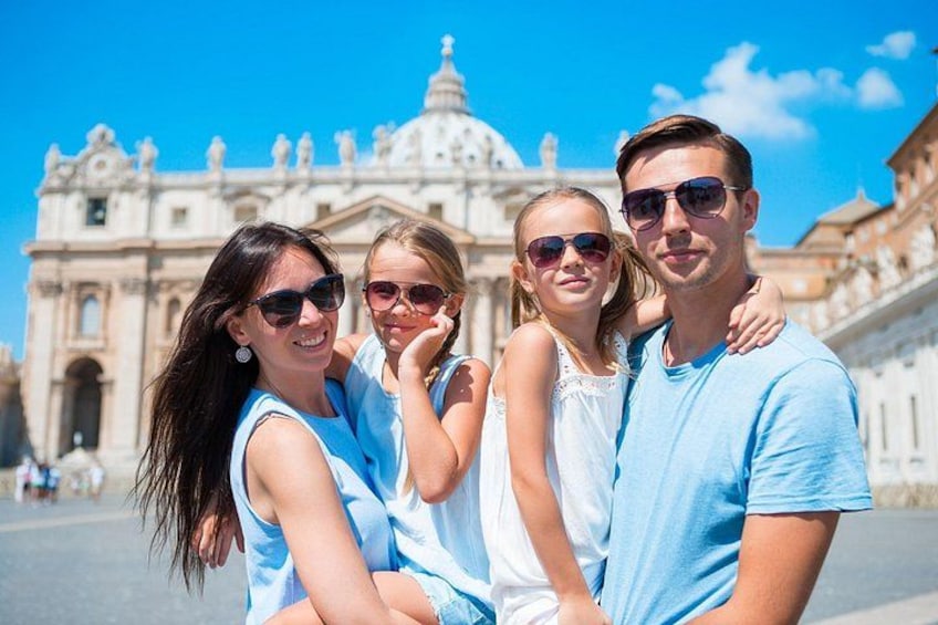 A group of people standing in front of a historic building with columns and domes. 5
