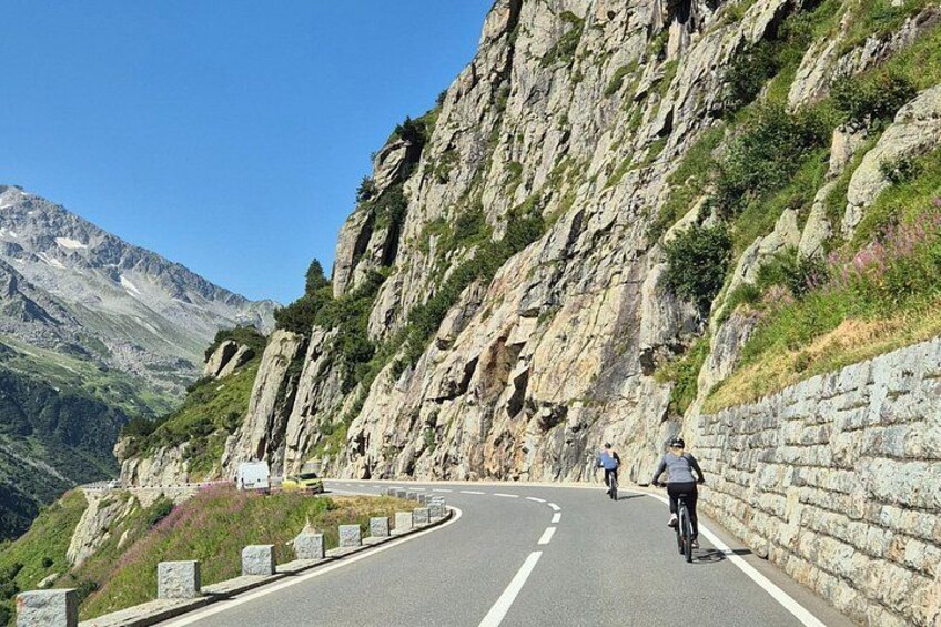 Alpine Pass Descent: Downhill Cycling Adventure in the Swiss Alps 3