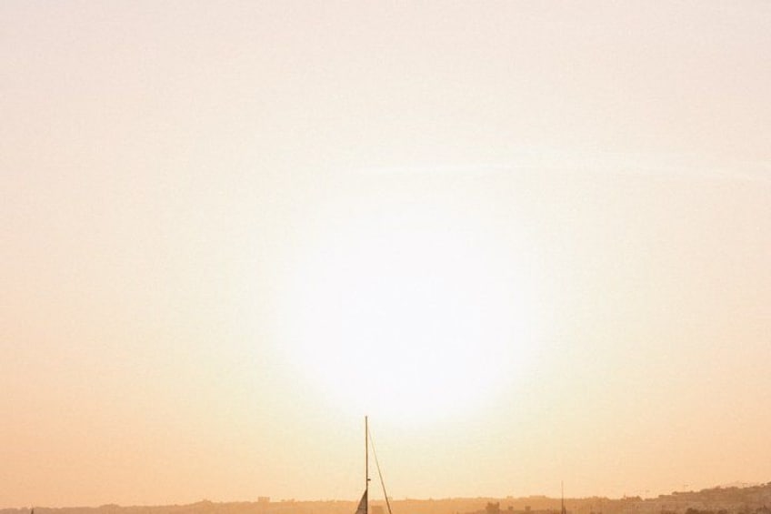 Lisbon: Sunset Catamaran Boat Tour with 1 Drink 4