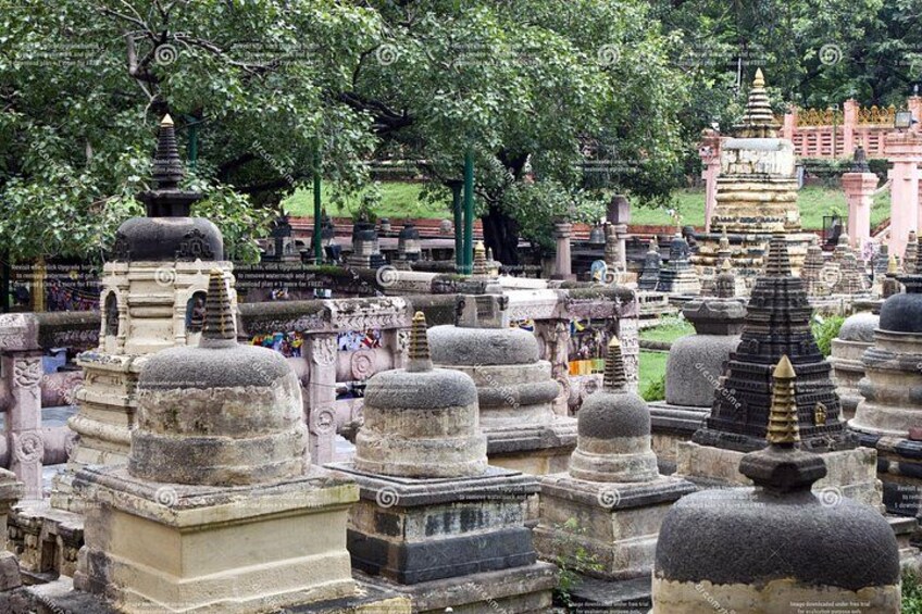 A collection of stone stupas in a temple complex. 2