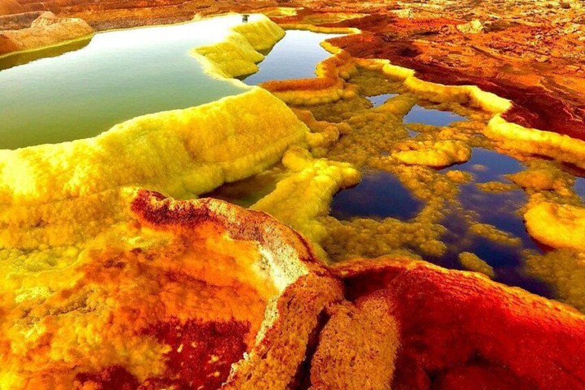 A landscape with mineral deposits and water bodies. 3