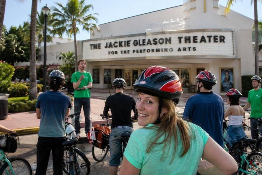 A group of cyclists in front of The Jackie Gleason Theater. 4