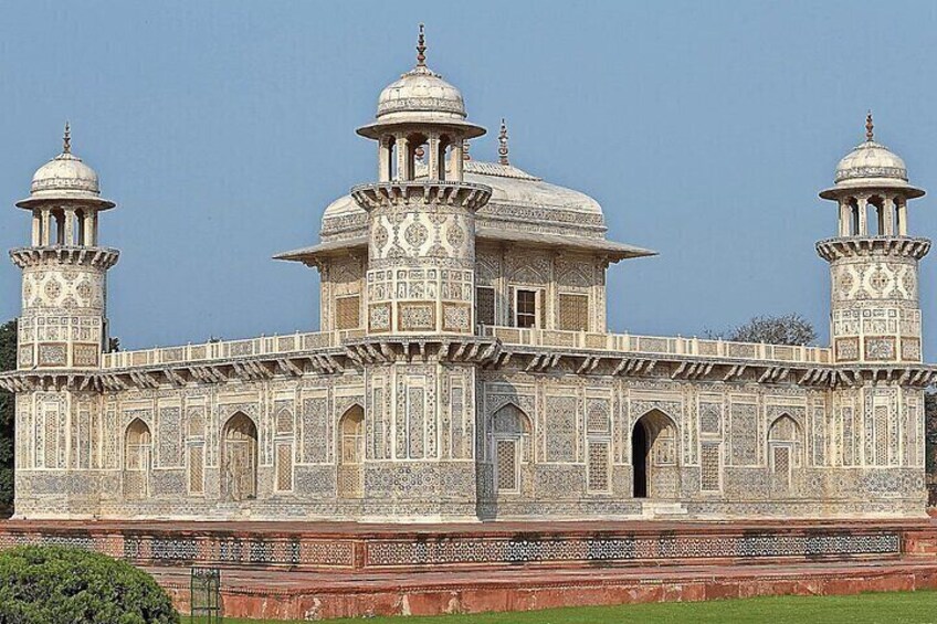 A large, ornate building with multiple domes and minarets. 4