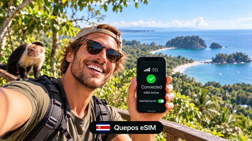 A person holding a smartphone displaying a 5G connection status with a tropical landscape in the background. 1