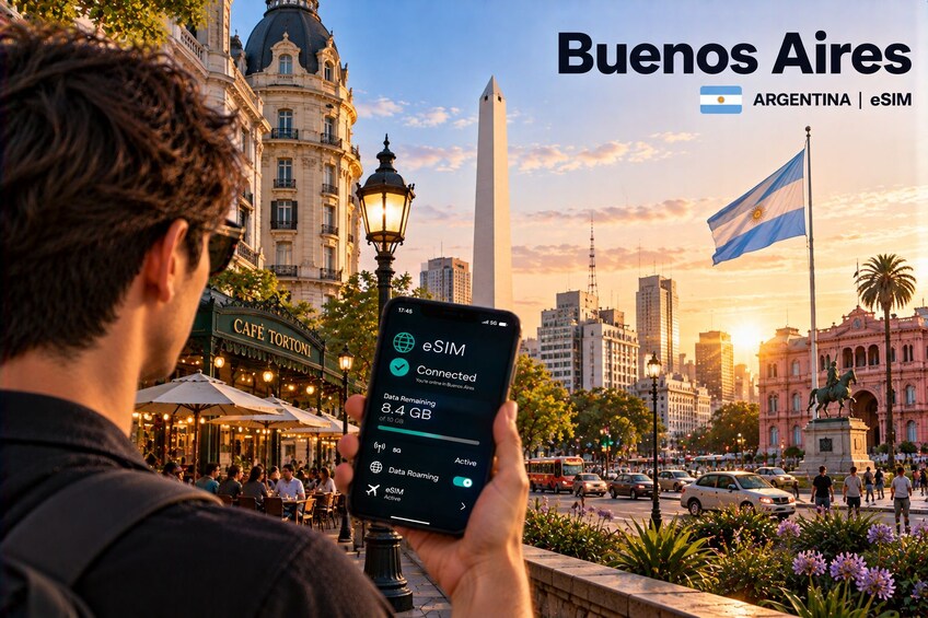 A person holding a smartphone with eSIM data roaming information in Buenos Aires, Argentina. 1