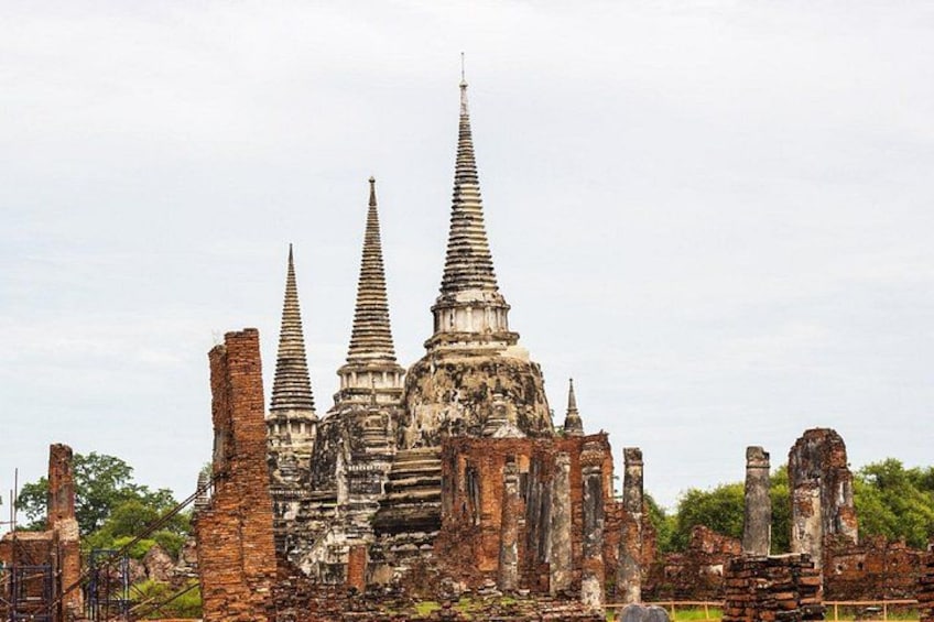 Ancient temple ruins with multiple spires and brick structures. 2