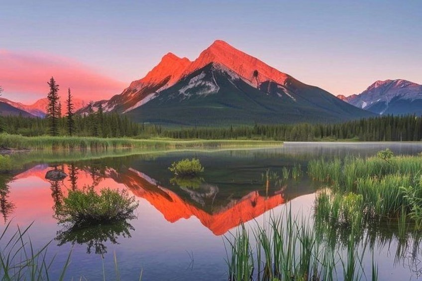 A mountain range, a lake, and a forest. 3
