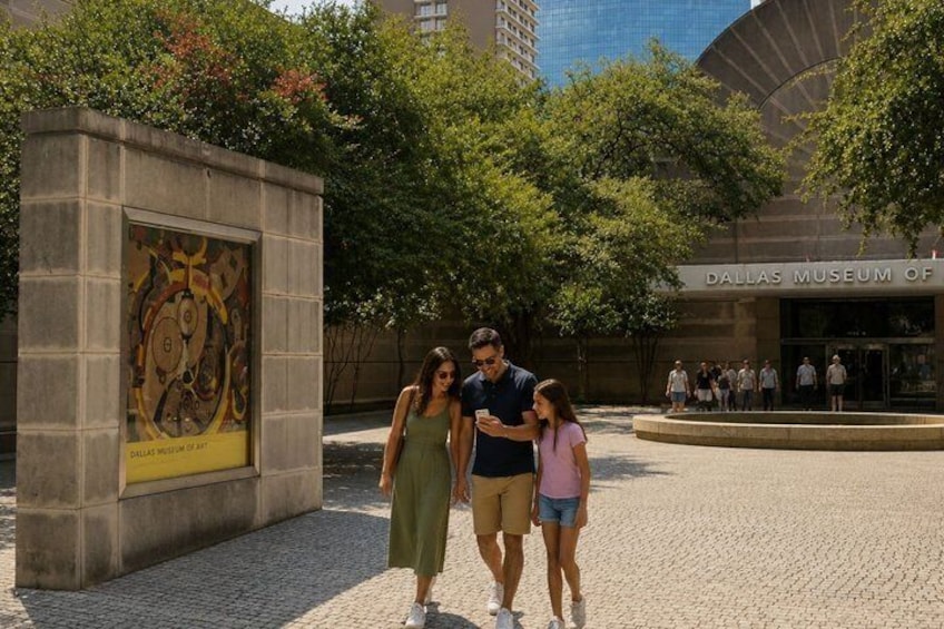 A group of people standing in front of the Dallas Museum of Art. 1