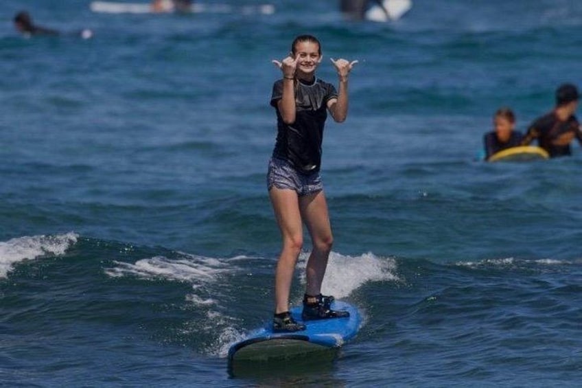 A person surfing on a wave. 2
