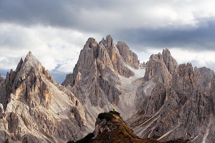 A rugged mountain range with sharp peaks and a valley. 5