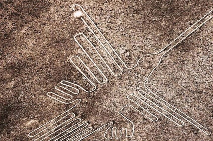 A hand-drawn sketch of a hand with a pen on a textured surface. 1