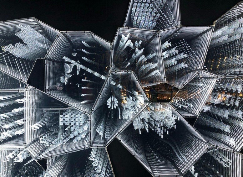 A complex geometric structure with multiple interconnected sections. 4