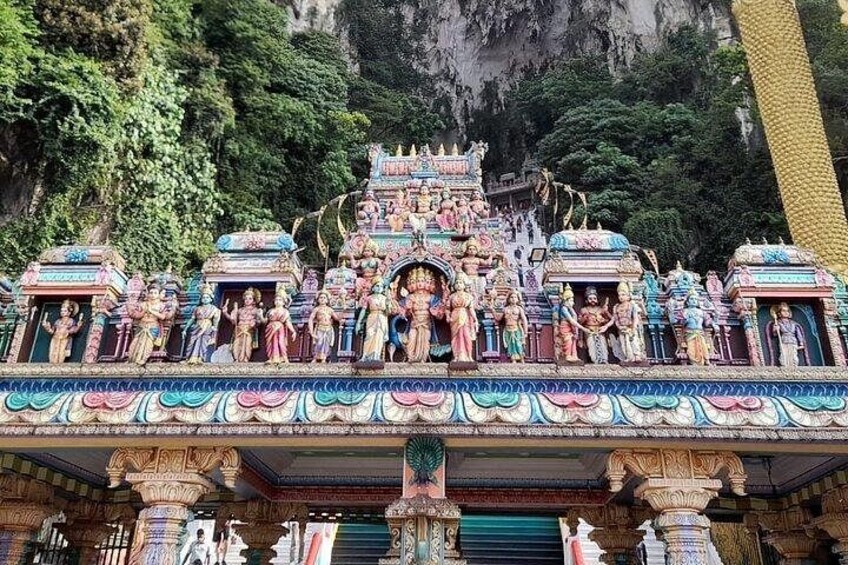 A temple with intricate carvings and statues. 2