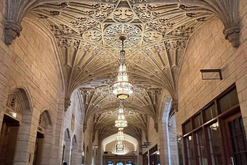 A cathedral interior with Gothic architecture, including pointed arches and a detailed ceiling. 1
