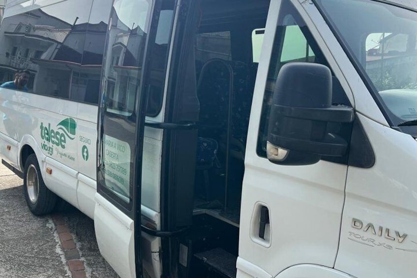 A white van with 'talesse' branding and 'DAILY TOUR' text. 5