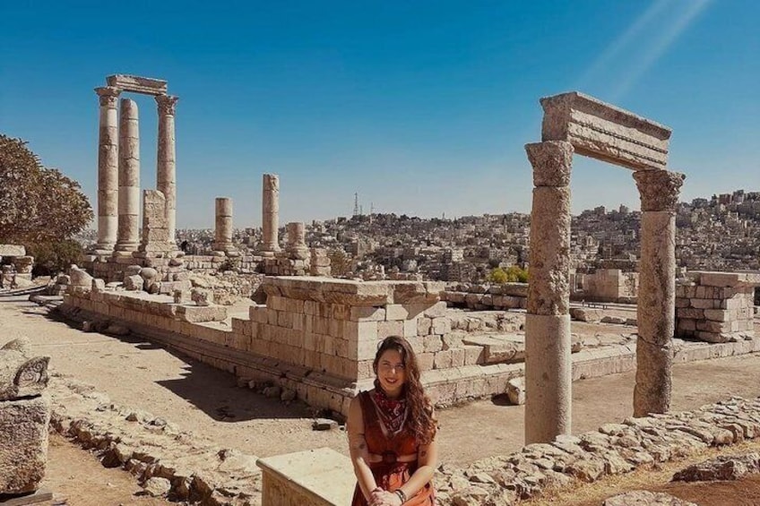 Ancient ruins with columns and stone structures. 5