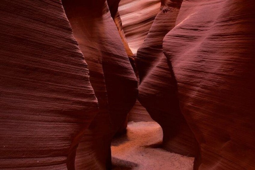 Walking through the winding paths of the slot canyon—a journey carved by time and nature. 2