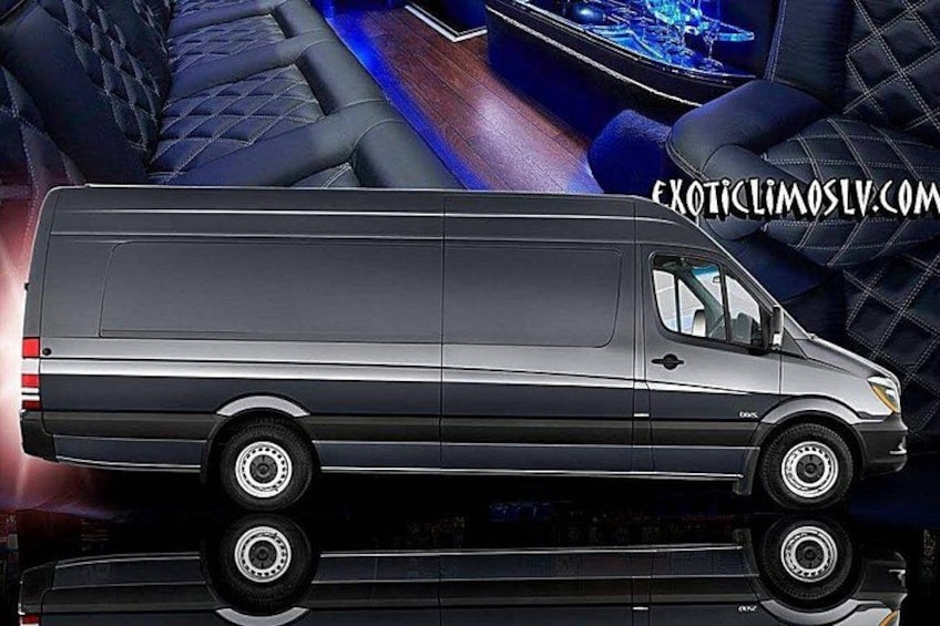 A black van with a reflective surface, a visible logo on the side, and a website address in the top right corner. 2