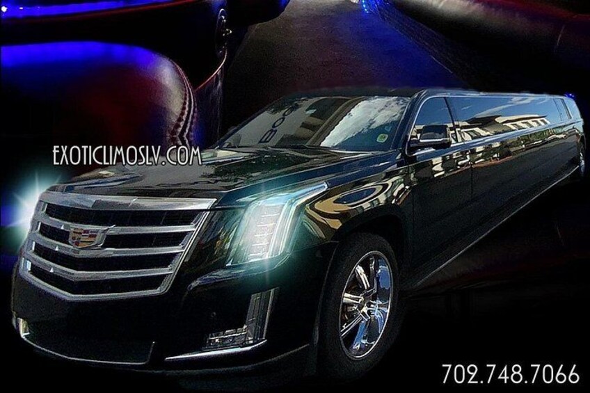 A black luxury SUV with chrome detailing and a visible logo. 3