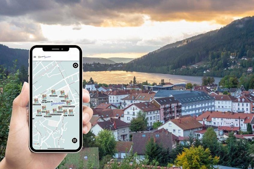 A smartphone displaying a map with a town and a river in the background. 1
