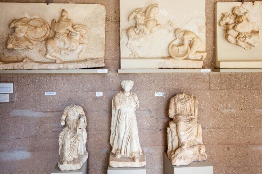 Admire the stunning marble reliefs and statues at the Archaeological Museum of Corinth, showcasing the artistry and culture of Ancient Greece. 1