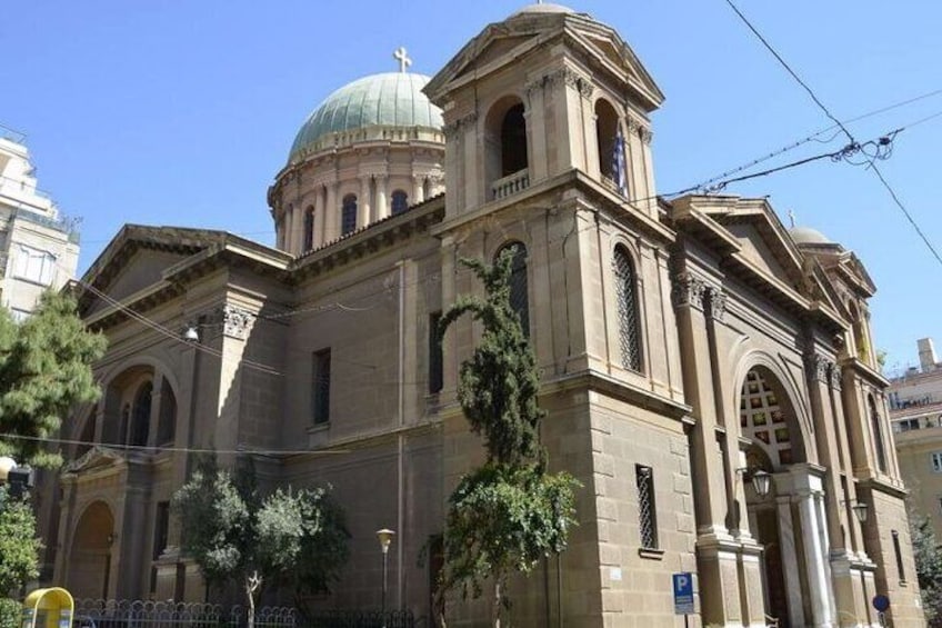 A historic church with a dome and bell tower. 4