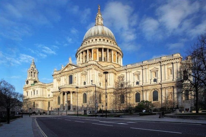 A large classical building with a prominent dome and columns. 5