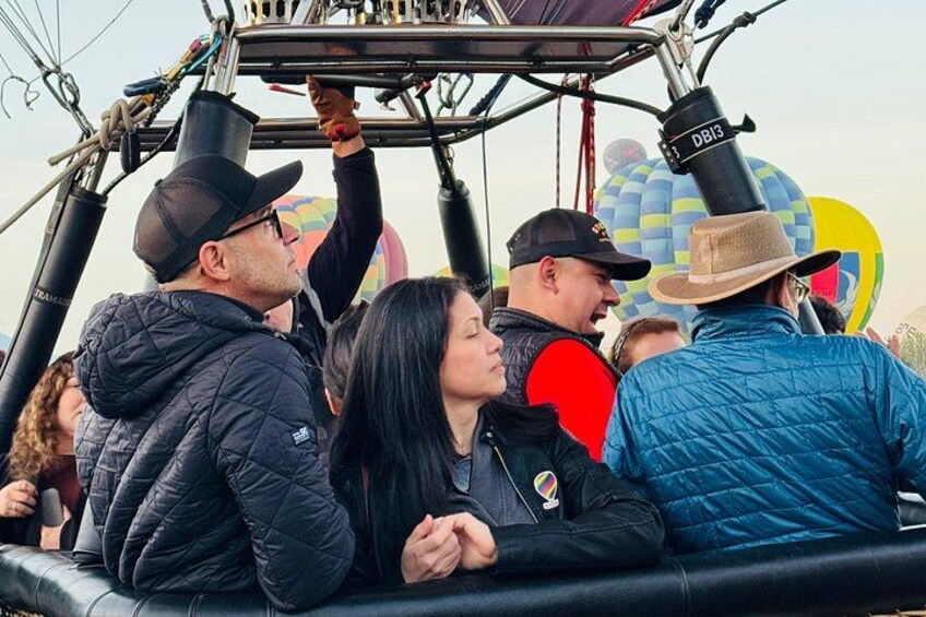 A hot air balloon with passengers. 4