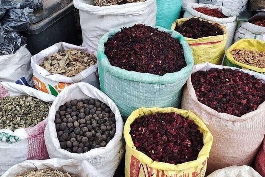 Various sacks filled with different types of dried herbs and spices. 4