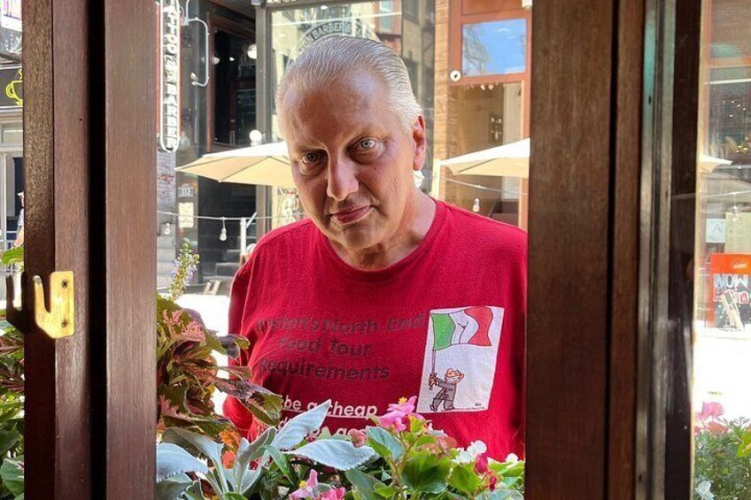 Anthony your guide peaking in a local restaurant at his group. Looks a little shady here. lol 3