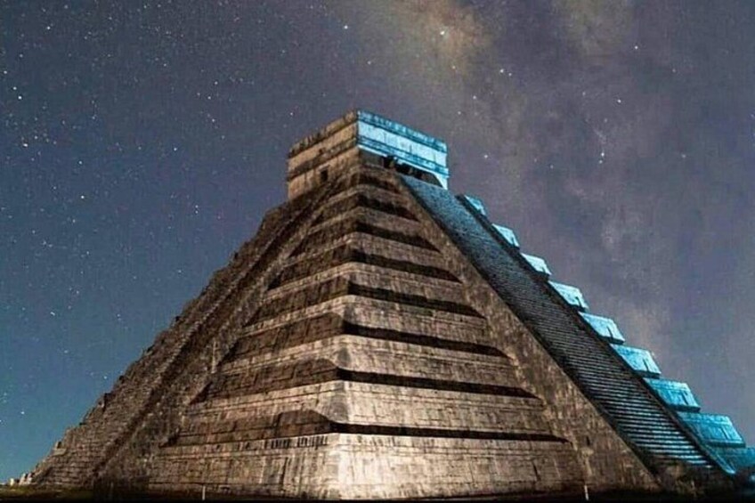 A large pyramid-like structure with a starry sky in the background. 4