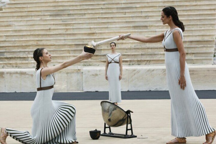 Lighting the Flame: A sacred ceremony honoring the spirit of the ancient Olympic Games. 1
