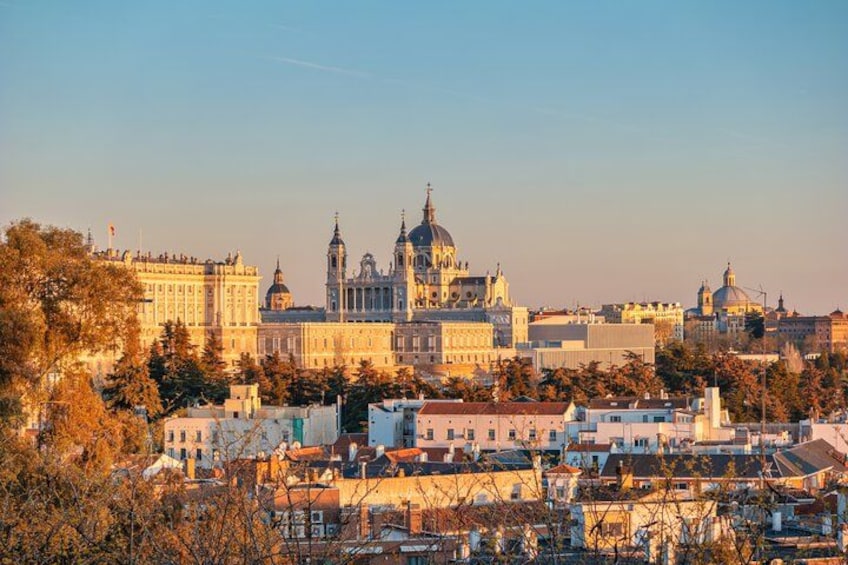 A cityscape with a prominent cathedral and surrounding buildings. 2
