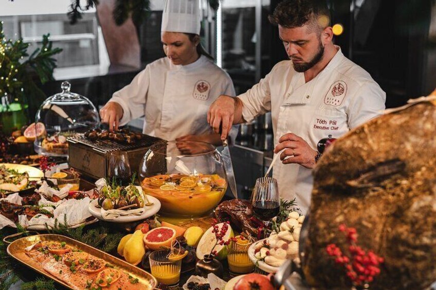 Chefs preparing food in a kitchen. 4