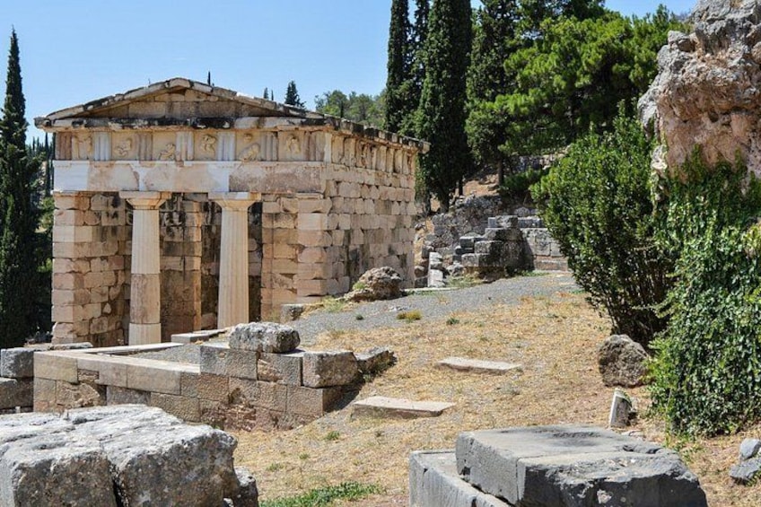 Ancient ruins with columns and stone structures. 5