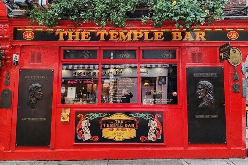 The Temple Bar, a red pub with a sign displaying 'The Temple Bar' and '48'. 2