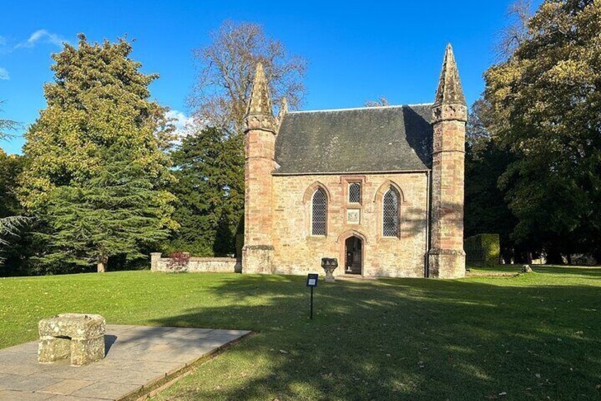 A historic church with a tall tower and arched windows. 5