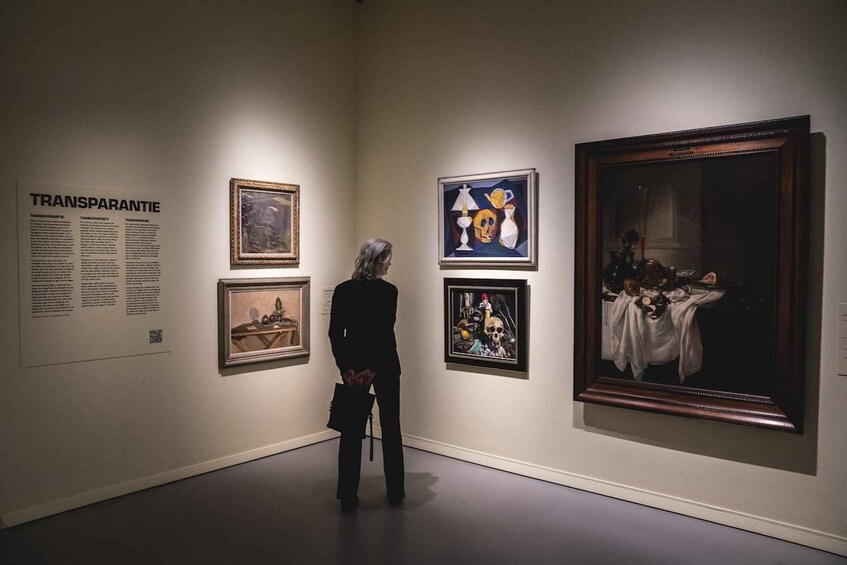 A person viewing art in a gallery. 5