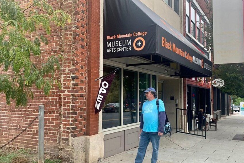 A brick building with a sign for Black Mountain College Museum of Fine Arts. 3