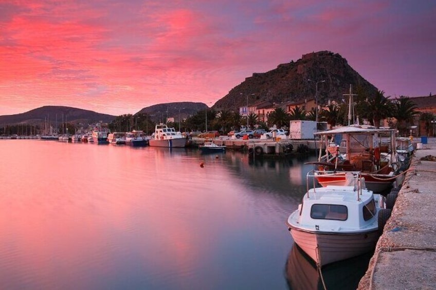 Nafplio at Sunset: A stunning view of Nafplio’s serene harbor bathed in the warm hues of a breathtaking sunset. 1