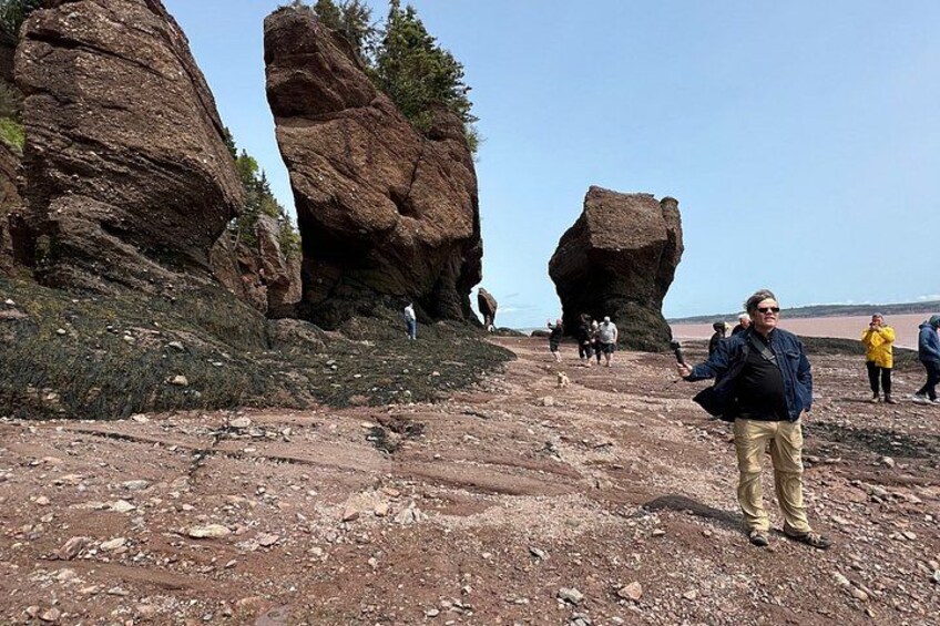 A rocky terrain with large rock formations and a clear sky. 2
