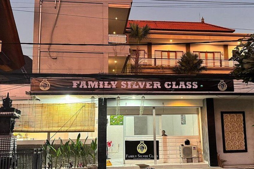 A building with a sign reading 'Family Silver Class.' 5