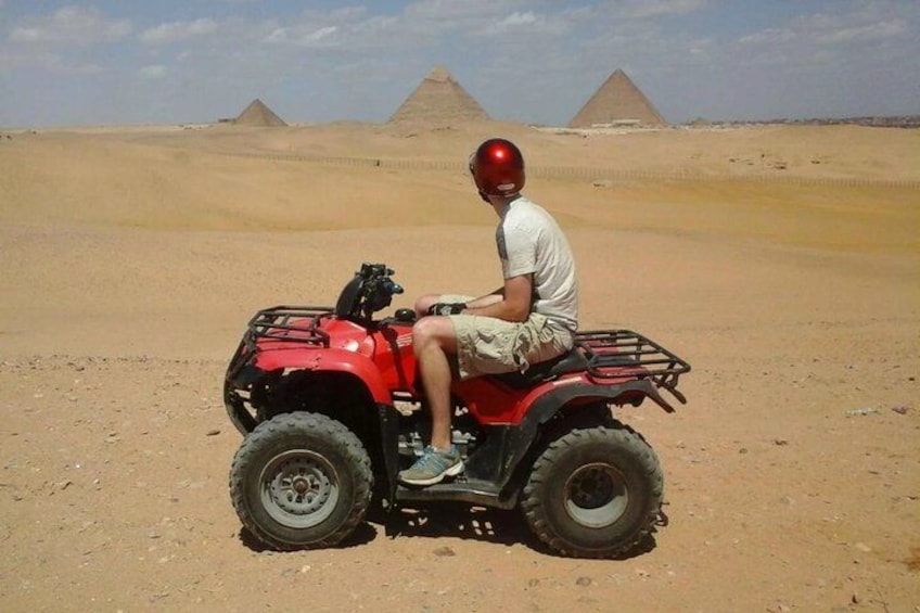 An unforgettable desert ATV experience, surrounded by the incredible beauty of Egypt's famous pyramids. 3