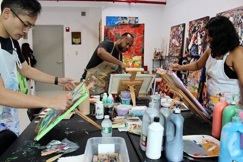 Instructor Ligel Lambert, M.Ed., MFA, guided participants through the Abstract Painting with Palette Knives workshop. 5