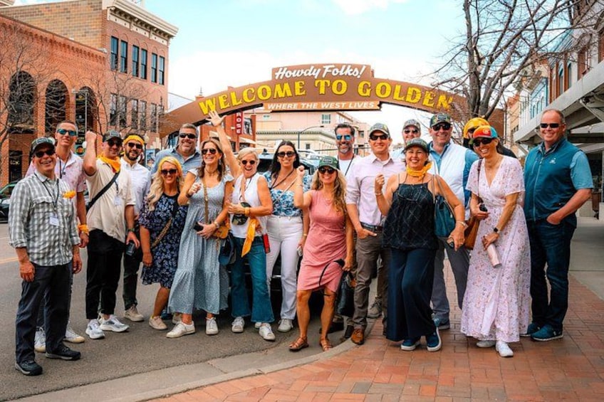 Large group under the Welcome to Golden sign. 2
