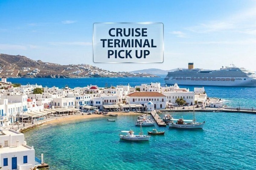 A coastal town with a cruise terminal, boats, and a large cruise ship in the background. 1